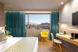 大雅典温德姆酒店客房内的一张或多张床位