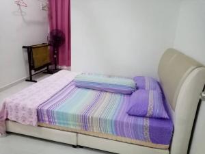 Homestay Seri Takir客房内的一张或多张床位