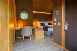 Quinta do Pedregal Hotel & Spa客房内的一张或多张床位