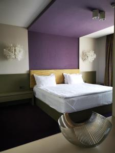 Park Hotel Romantica客房内的一张或多张床位