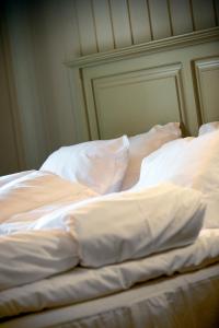 克罗克斯特德赫尔加德酒店客房内的一张或多张床位