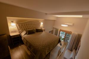 STORK Design Suites客房内的一张或多张床位