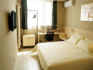 锦江之星营口港务局鲅鱼圈世纪广场酒店客房内的一张或多张床位