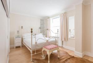 Marylebone Luxury Duplex客房内的一张或多张床位