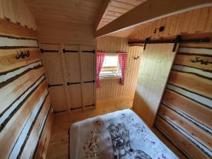 Tiny House Het Reebokje客房内的一张或多张床位