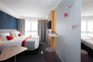 Holiday Inn Express - Rouen Centre - Rive Gauche, an IHG Hotel客房内的一张或多张床位