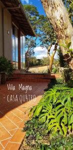 迪亚曼蒂纳Pousada Villa Magna - Casa 4的玛格丽塔卡萨库拉别墅的标志