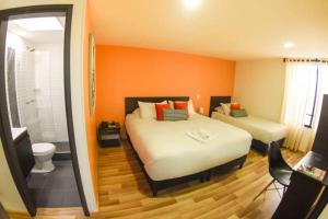 Terraza Hotel Bogota客房内的一张或多张床位