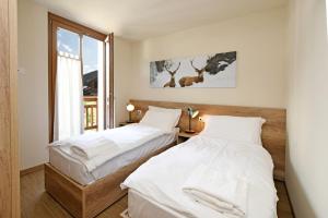 Ai Suma Residence客房内的一张或多张床位