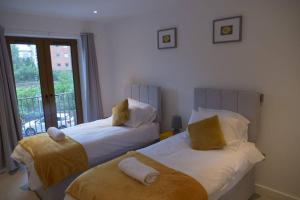 Maplewood properties - St Albans one bedroom luxurious flat客房内的一张或多张床位