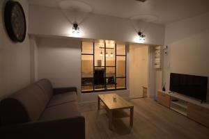 Cosy appartement Hyper centre ville avec cour + Patio的休息区