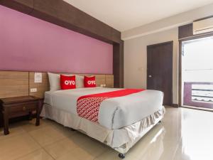 OYO 1127 Baan Siam Hotel客房内的一张或多张床位