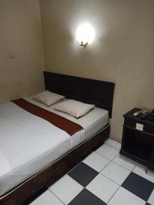 Hotel Srikandi客房内的一张或多张床位