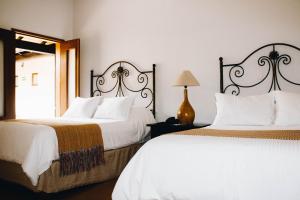 Hotel La Casona de Don Jorge客房内的一张或多张床位