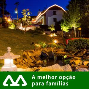 坎波斯杜若尔当玛特苏博瑞酒店的夜晚在院子里前的一个小故事,在家庭的标志上