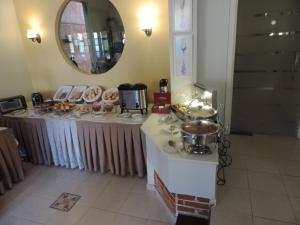 Hotel Costa Balena-Piscina Aquecida Coberta餐厅或其他用餐的地方