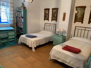 EL CONVENTO Vivienda Rural Jaén Andalucía España客房内的一张或多张床位