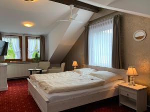 Hotel Garni Maaß客房内的一张或多张床位
