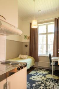 Huoneistohotelli Marja客房内的一张或多张床位