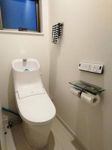 クレアゲハウス新百合ケ丘的一间浴室