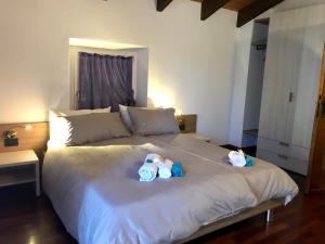 Al Chiar di Luna B&B Valtellina客房内的一张或多张床位