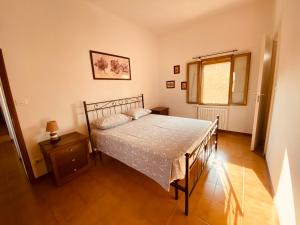 B&B Villino Margherita客房内的一张或多张床位
