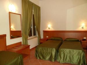 Park Hotel Villamaria客房内的一张或多张床位