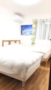 竹内公寓客房内的一张或多张床位