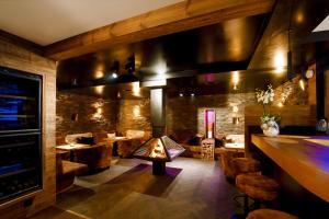 PETE Alpine Boutique Hotel - klein und fein - Private SPA Suiten und Zimmer的休息区