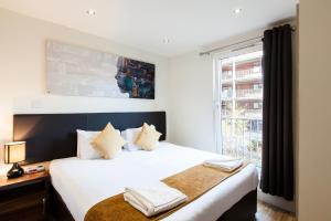 Staycity Aparthotels Edinburgh West End客房内的一张或多张床位