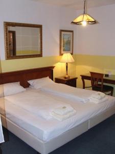 奥尔索耶霍夫酒店及餐厅客房内的一张或多张床位