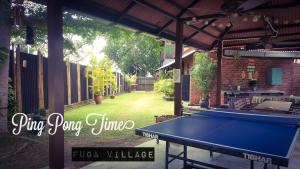 Fuga Village BeachGetaway内部或周边的乒乓球设施