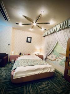 嵯峨野酒店（仅限成人）客房内的一张或多张床位