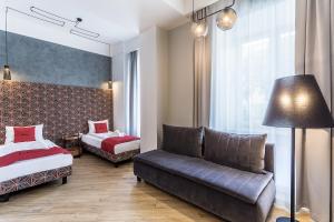 Apartamenty Nowa Kamienica Częstochowa Centrum Szymanowskiego 22A客房内的一张或多张床位