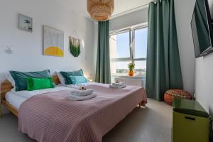 Apartamenty Your Seaside客房内的一张或多张床位