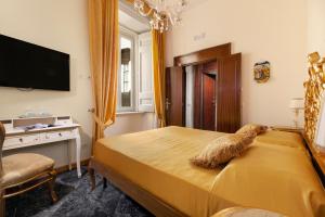 Relais Antica Napoli客房内的一张或多张床位
