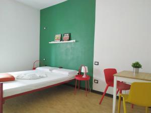 Ostello di Saronno - Malpensa Hostel客房内的一张或多张床位