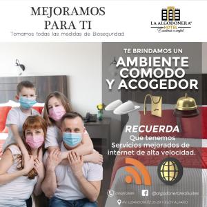 安巴托Hotel La Algodonera的一张戴面具的家庭海报
