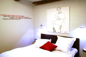 孙登伯格霍夫旅馆的墙上挂着一幅画的人的卧室