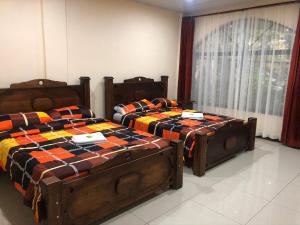 Hospedaje Adrimaran客房内的一张或多张床位
