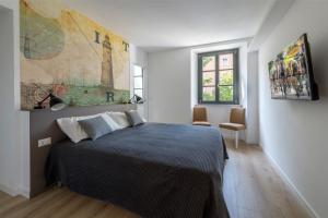 Residence La Torre客房内的一张或多张床位