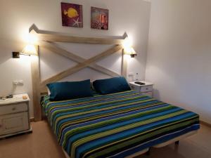 Appartamento privato Oasis Tamarindo客房内的一张或多张床位