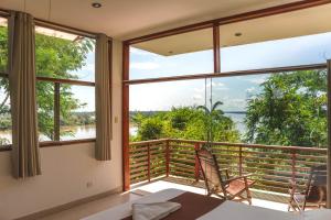 马尔多纳多港瓦赛普尔托玛尔多纳多生态旅馆的客房设有海景阳台。