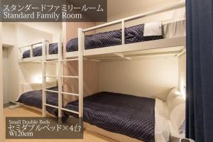 福冈MK Hotels Nishinakasu的双层床间 - 带两张双层床