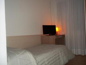 格昂达兰古娜酒店客房内的一张或多张床位