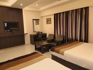 Hotel Deepam客房内的一张或多张床位