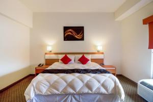 Capital O Hotel Herederos, Piedras Negras客房内的一张或多张床位