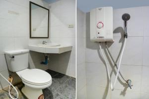 高兰Salatan Resort的一间带卫生间和水槽的浴室