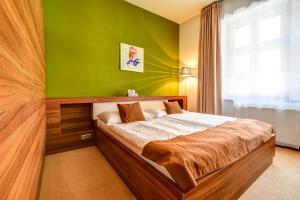 Černý Orel – Pivovar, Čokoládovna a Wellness Hotel客房内的一张或多张床位