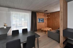 Apartmány Tri sestry - real SKI IN SKI OUT的休息区